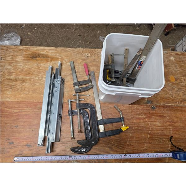 Bucket of clamps