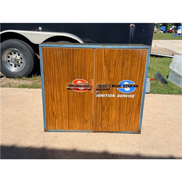 VINTAGE 1960S–1970S STANDARD BLUE STREAK IGNITION SERVICE METAL AND WOOD-GRAIN WALL CABINET
