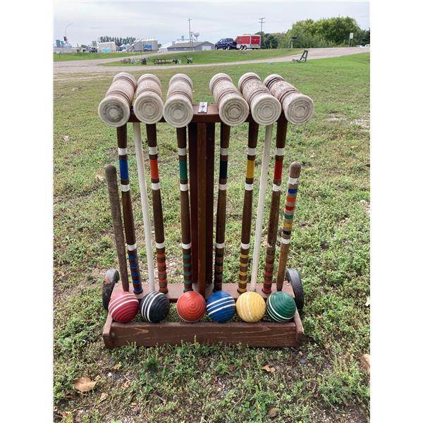 VINTAGE WOODEN 6-PLAYER CROQUET SET HOUSED IN A ROLLING WOODEN CADDY CART WITH WHEELS