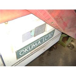 1989 OKUMA MODEL LC-10 CNC LATHE WITH CHIP Extra Sequence #: CONVEYOR