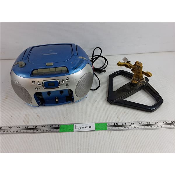 CD-R/Radio Player - Powers On, As Is, Garden Sprinkler