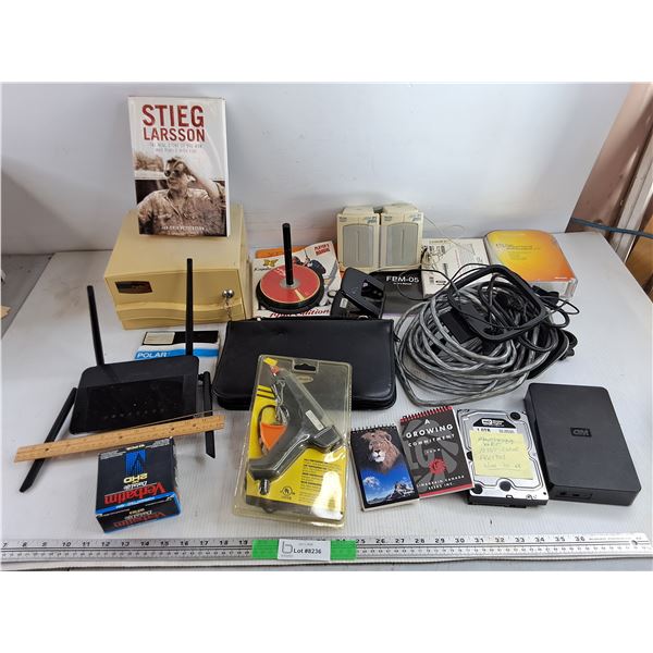 Speakers, CD Bag, D Link Wifi Router, WD Hard Drive, Paper Hole Punch, Glue Gun, Misc