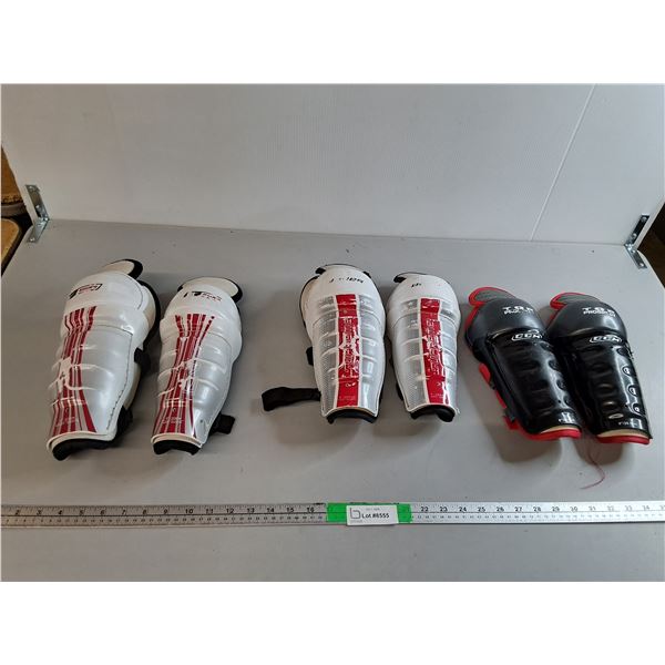 (3) Sets of Child Hockey Shin Pads- 8", M, L