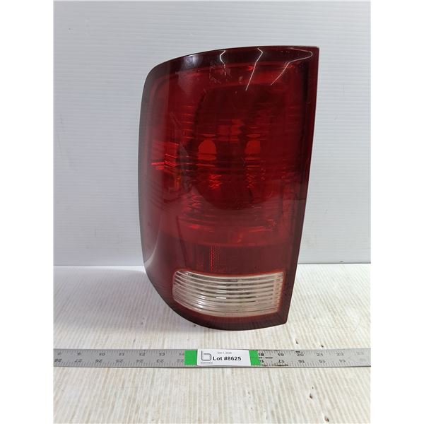 (1) 2009-2012 Dodge Ram 1500 Driver Side Tail Lamp