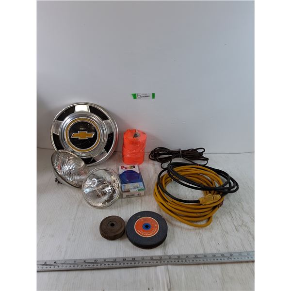 (2) Lamp Bulbs, (3) Power Cords Untested, (2) Grinding Wheels, Surveyor's Tape, Chevy Hubcap