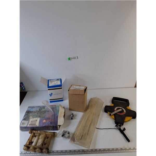 Box of Cable Staples, Zinc 90 Degree Connectors, Redball Spray Monitor, Zip Ties, Lufkin 50m Tufboy