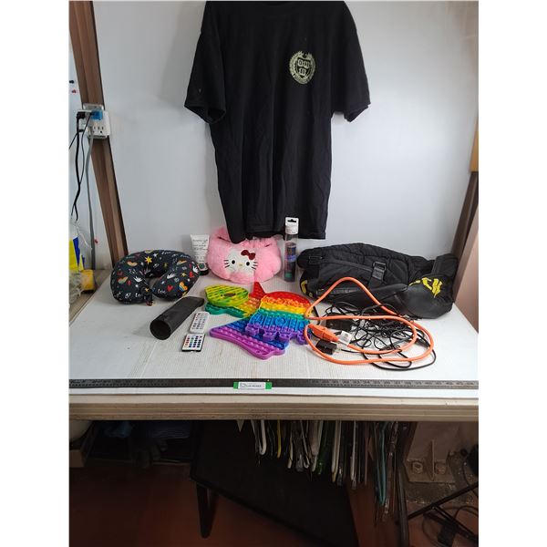 XL T-Shirt, (3) Popits, Hello Kitty, Duffel Bag, Travel Pillow, and Misc. Power Cables & Electronics