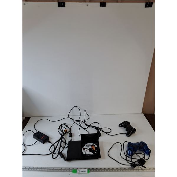 PS2 Slim Powers On with (2) Controllers, Power and AV Cables, NHL 2002