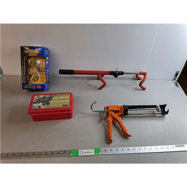 Schlage Deadbolt Kit, First Aid Kit, Steering Wheel Lock, Caulking Gun