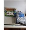 Image 1 : Partial Box of Unused Mole Pipe, Bag of Bulk Clothes Hangers