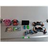 Image 1 : (2) Furbies- One Powers On, (2) Playstation Games, Nintendo Switch Console Docks, Misc.