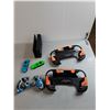Image 2 : (2) Furbies- One Powers On, (2) Playstation Games, Nintendo Switch Console Docks, Misc.