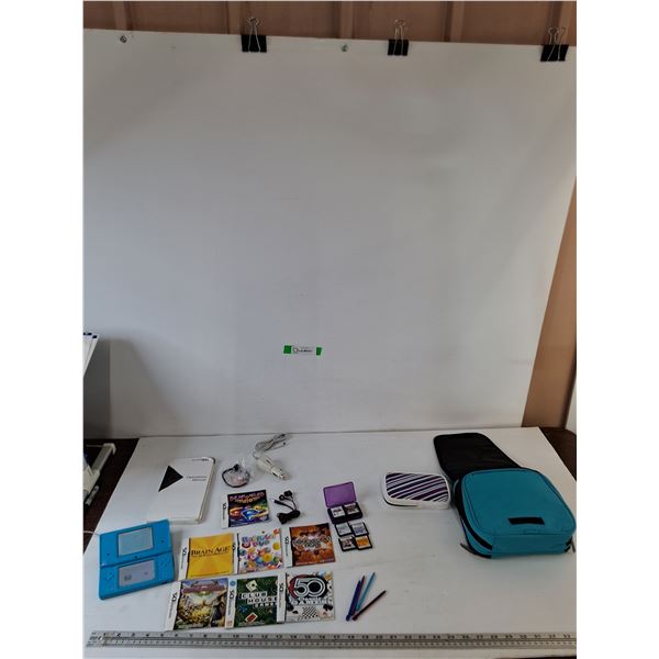 Nintendo DS Powers On with (6) Games, (4) Stylus, Manual, Carry Case, Charging Cord, Misc