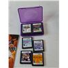Image 4 : Nintendo DS Powers On with (6) Games, (4) Stylus, Manual, Carry Case, Charging Cord, Misc