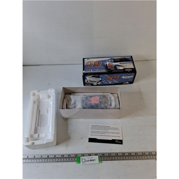 Nascar David Reutimann 99 1:24 Scale Aaron's 2007 Camry Stock Car NIB