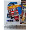 Image 2 : Hot Wheels Transformers Optimus Prime, Autobot Brawn Action Figure, Transformers Book