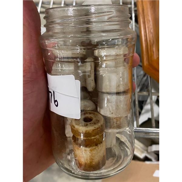 SMALL JAR OF PORCELAIN INSULATORS