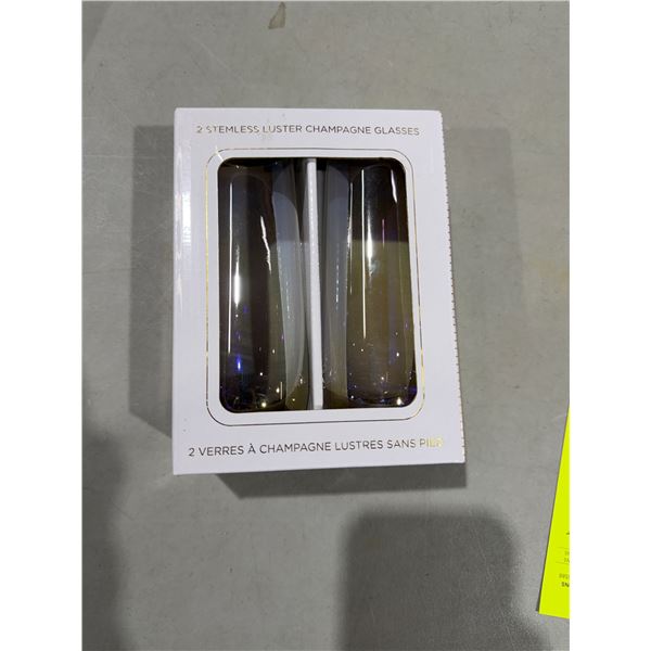 Two stemless luster, champagne, glasses