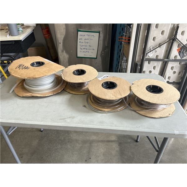 4 ROLLS OF PLASTIC TUBING