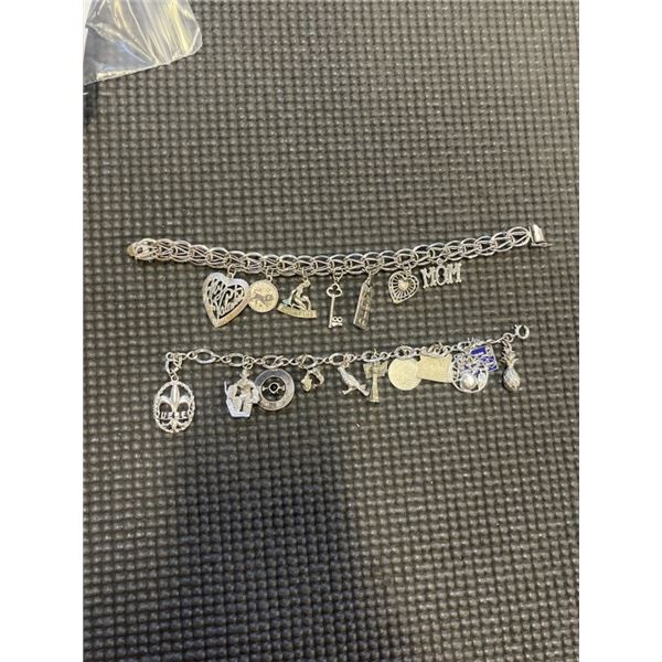 2 SILVER TONED BRACELETS & CHARMS