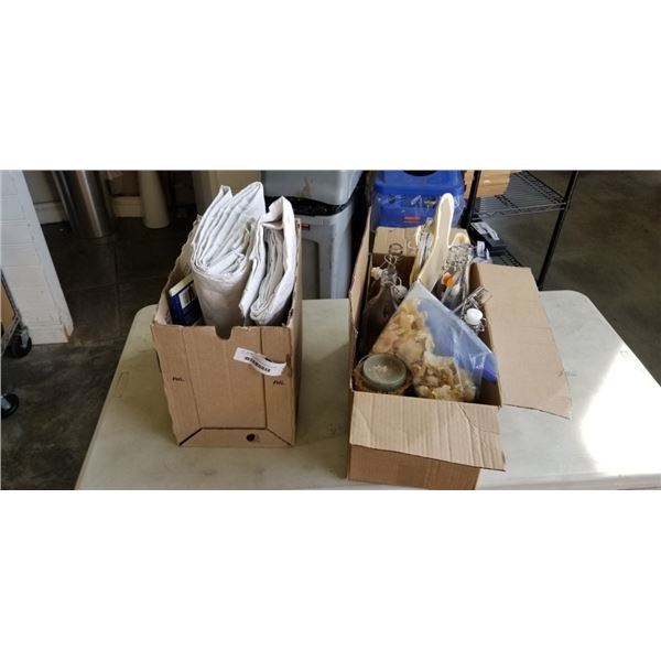 2 BOXES OF WEDDING DECORATIVE ITEMS INCLUDING PLASTIC PADDED TABLE COVERS, CANDLES, DECORATIVE BELLS