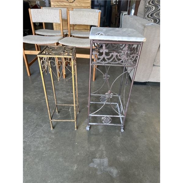 2 METAL PLANT STANDS. ONE HAS A MARBLE TOP