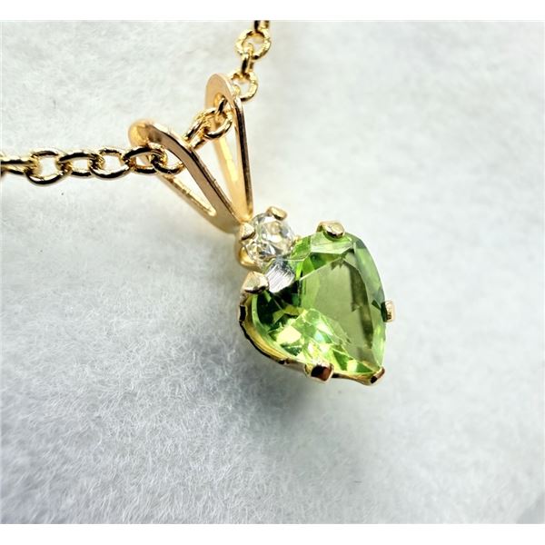 10KT YELLOW GOLD NATURAL PERIDOT WITH CZ HEART PENDANT WITH BRASS GOLD PLATED CHAIN, RETAIL $400.00.