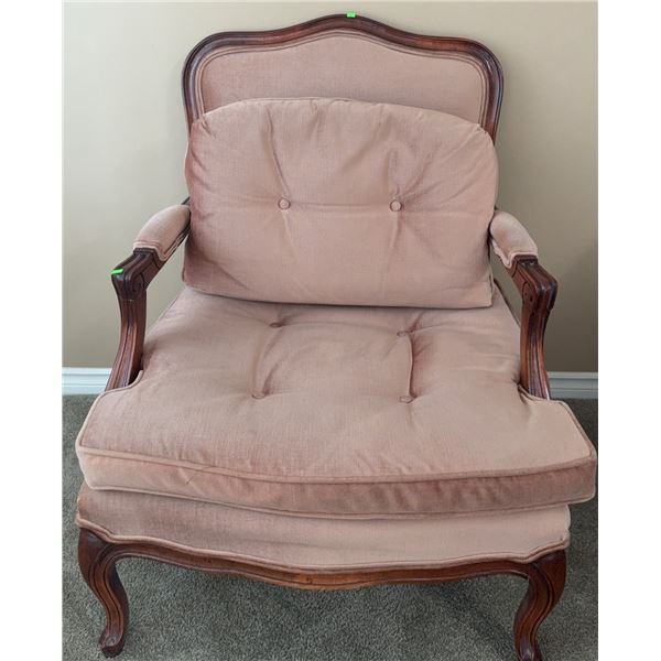 Upholstered Wood Armchair with Carved Details and Pink Cushions