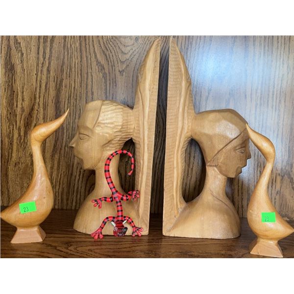 Carved Wood Bookends, Duck Figures, and Striped Gecko Figurine