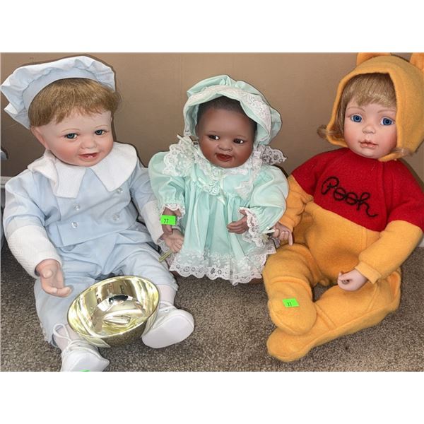 Three Porcelain Dolls Including Pooh Bear Costume and Lace Dress