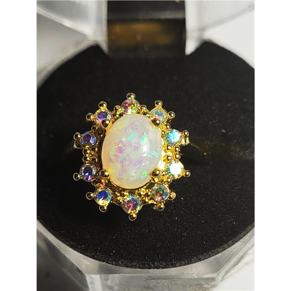 5)  GOLD TONE SIZE 7 OVAL LAB CREATED