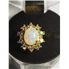 Image 1 : 5)  GOLD TONE SIZE 7 OVAL LAB CREATED