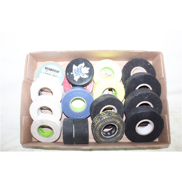 16 HOCKEY STICK TAPE ROLLS & 1 HOCKEY PUCK