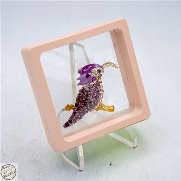 NEW HUMMINGBIRD ENCRUSTED WITH PURPLE,