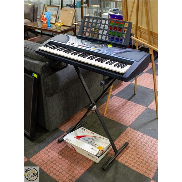 VINTAGE YAMAHA KEYBOARD WITH BOOKS AND STAND