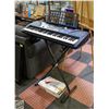 Image 1 : VINTAGE YAMAHA KEYBOARD WITH BOOKS AND STAND