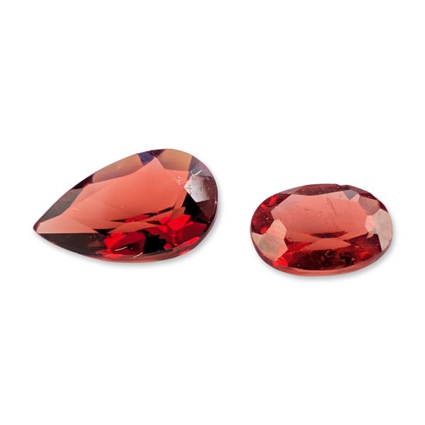 Pair of Faceted Red Gemstones Pear and Oval