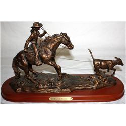 Bronze Statue Of A Cowboy On A Horse