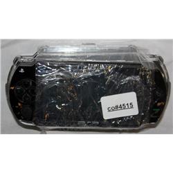 Black Playstation Portable With A Case