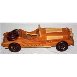 Wooden Model Of A Car With A Musical Box