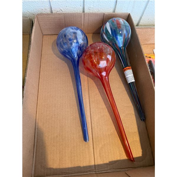 Glass watering globes