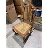 Image 1 : vintage or antique wooden rocking chair with a woven cane seat