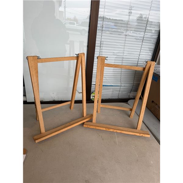 Two folding easels