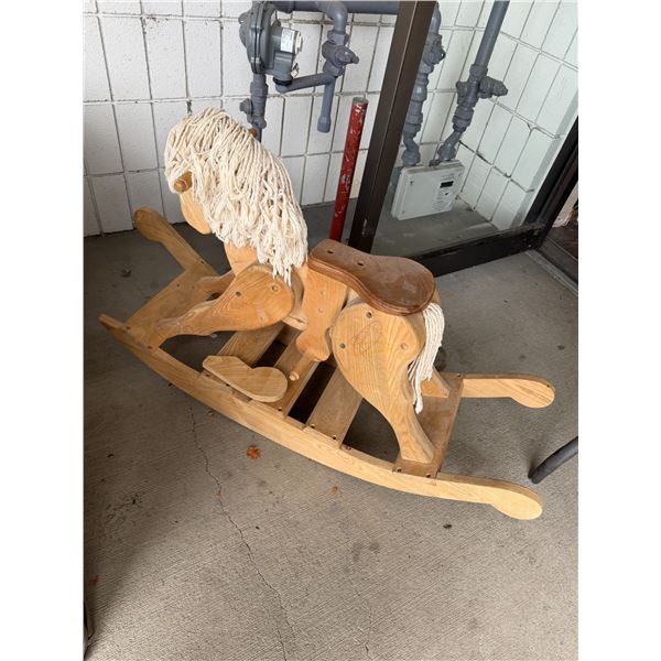 Rocking horse Foot needs repair. Peace is here.
