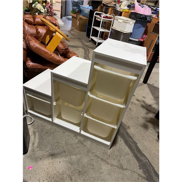 Shelf with storage bins