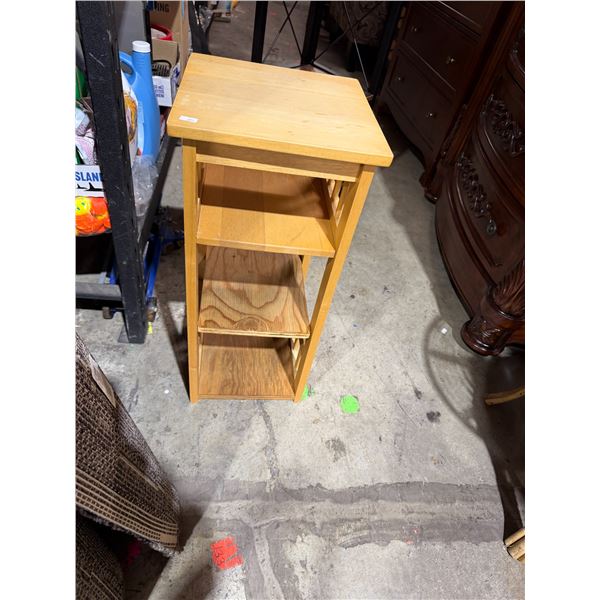 Square smaller shelf 11 and three-quarter inches by 11 and three-quarter inches by 26 inches tall