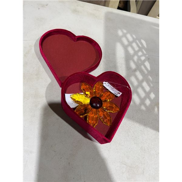 Flower decor in heart shaped container