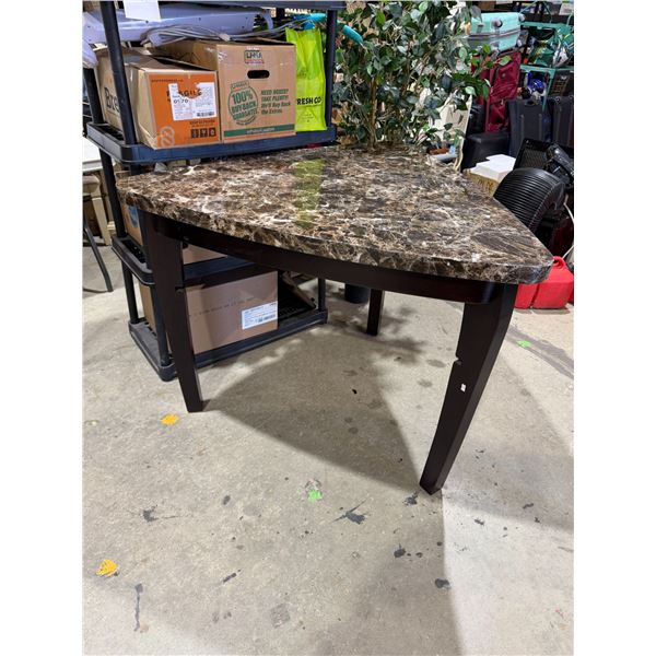 Guitar Pick shaped table 45 inches and 36 inches tall has chip on edge