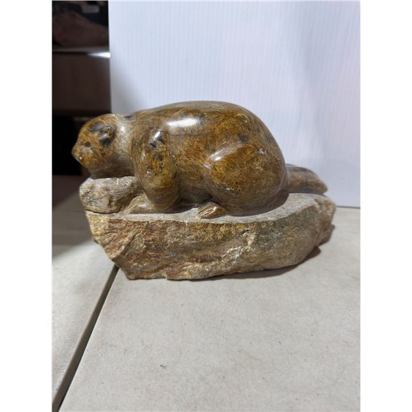 Carved sandstone beaver. signed
