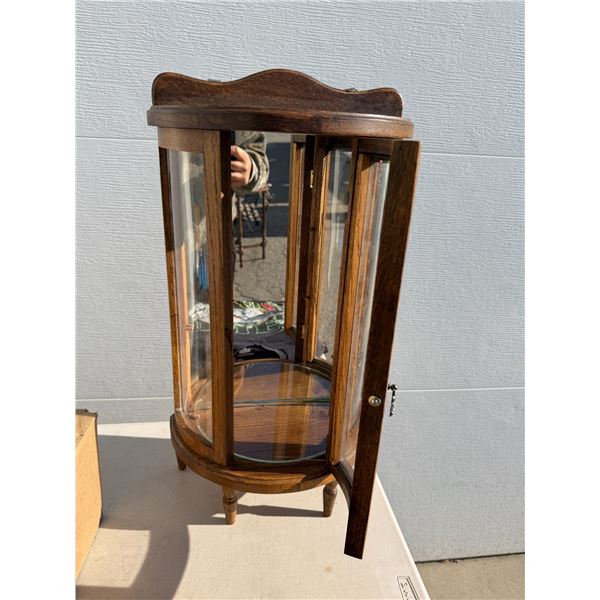 Curio cabinet with glass shelves